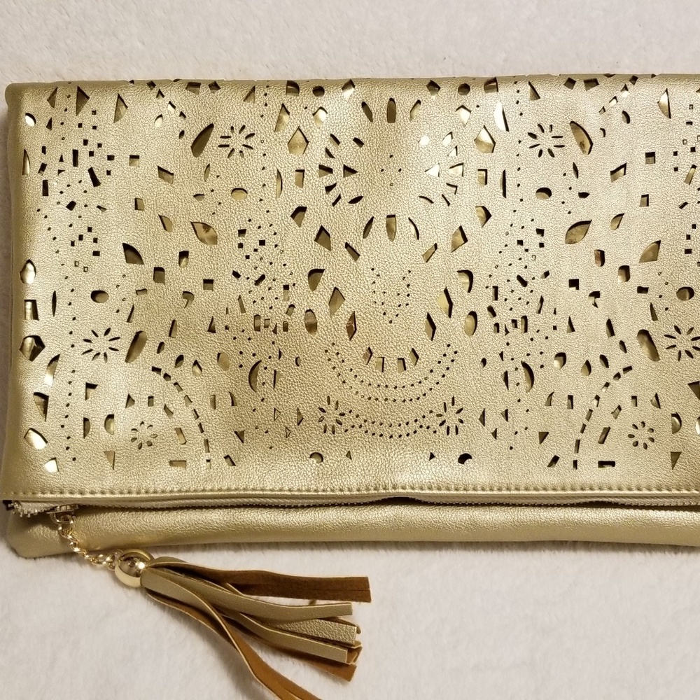 Convertible clutch purse in matte gold/ ov…